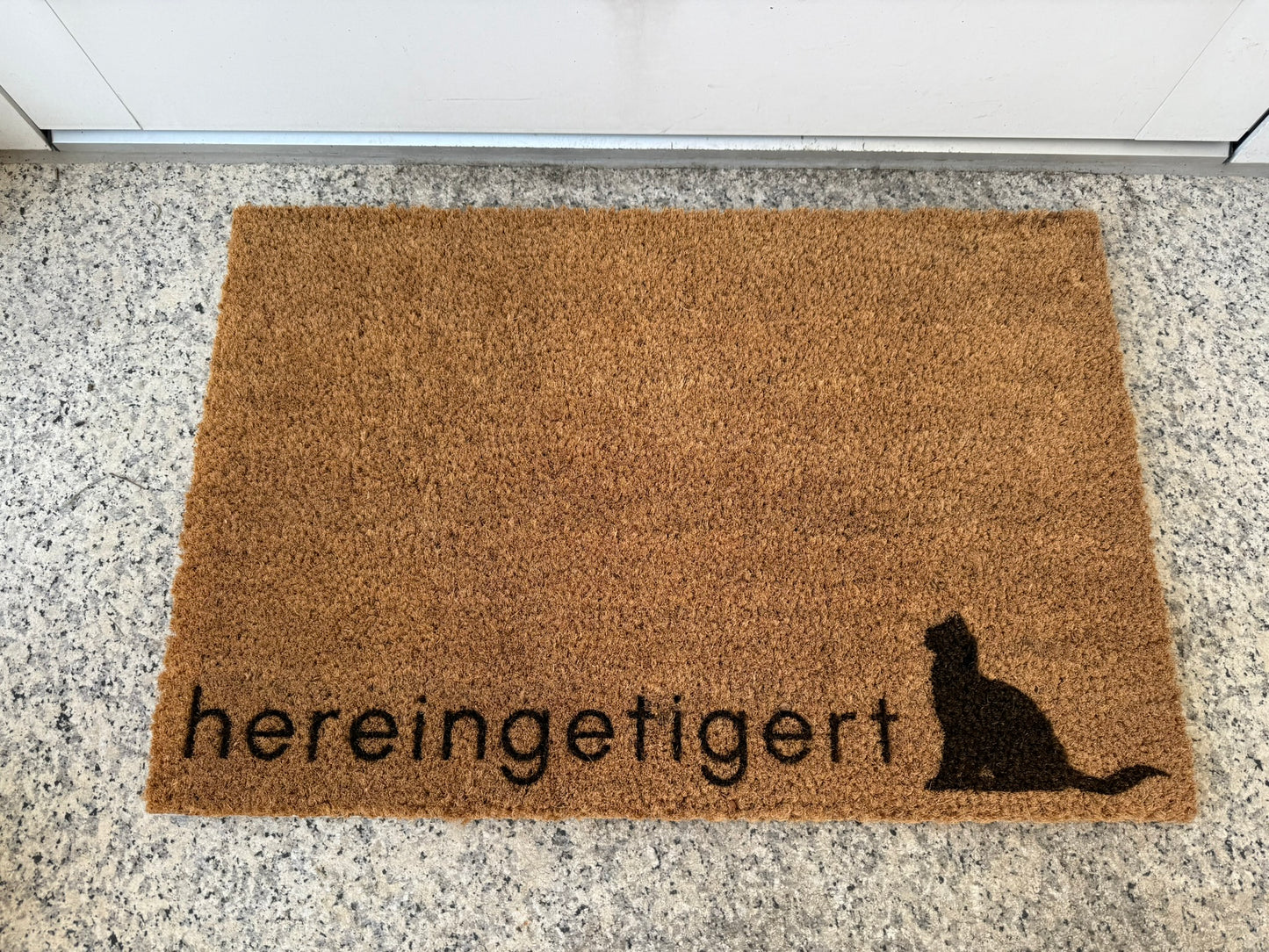 Fußmatte "hereingetigert"