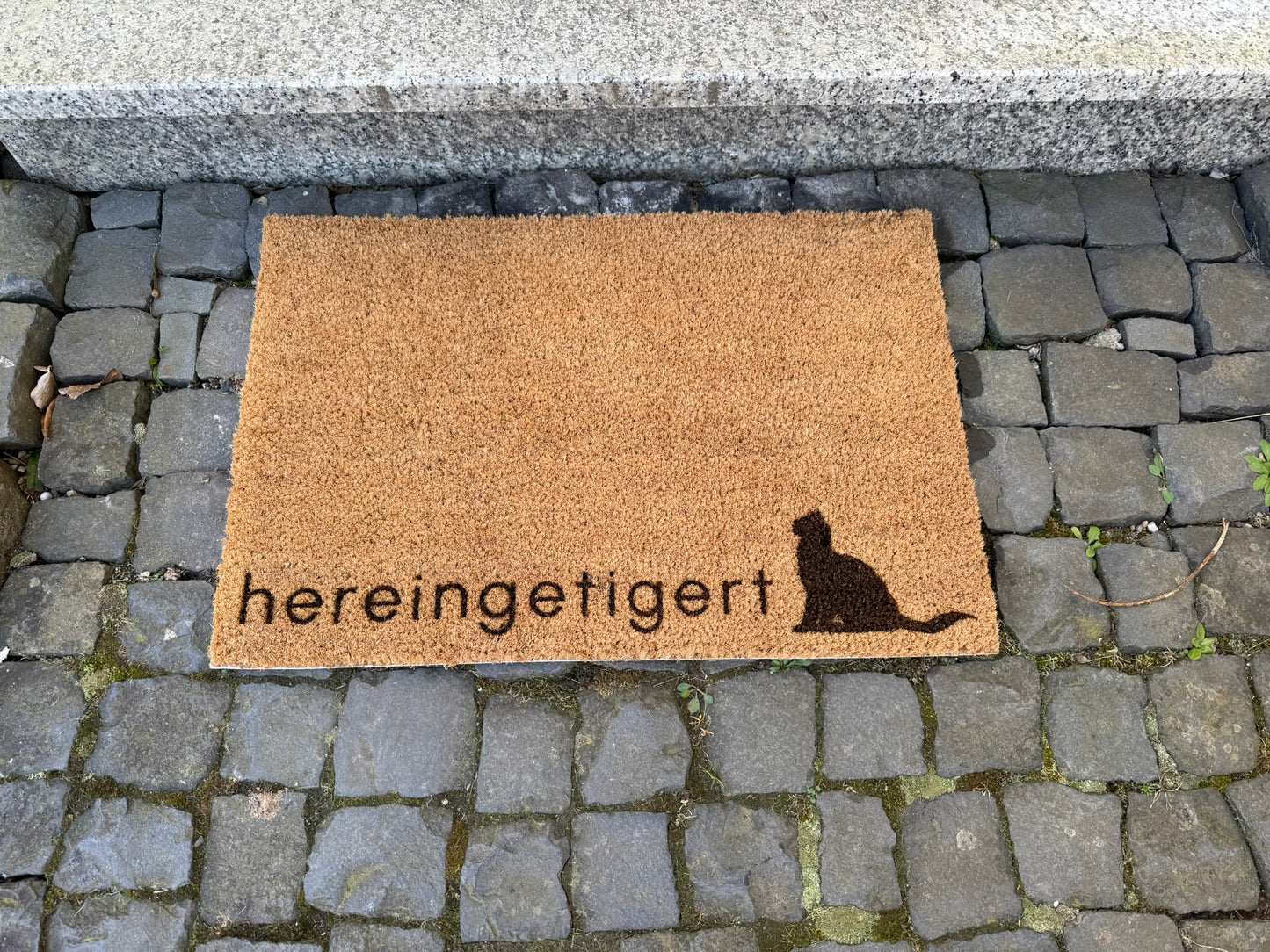Fußmatte "hereingetigert"